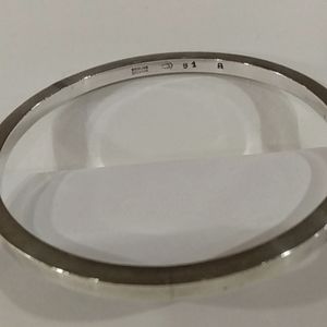 Delicate and simple sterling silver bangle bracelet.